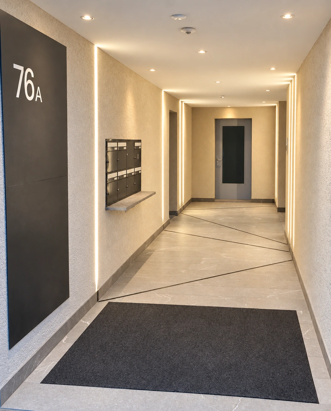 The illuminated corridor leading to the UNITY studio at Domaine du Village